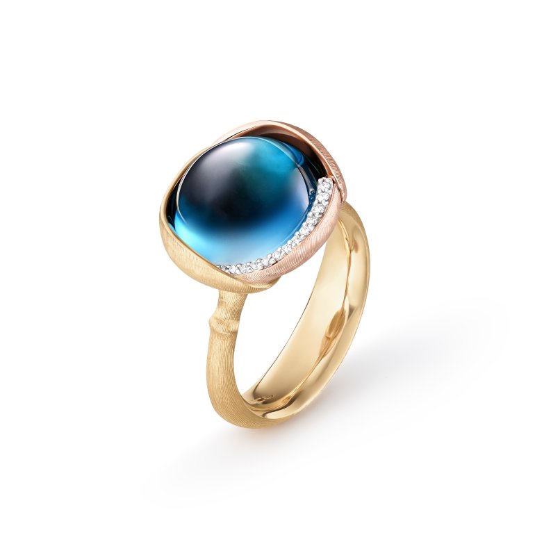 OLE LYNGGAARD COPENHAGEN: Lotus ring i 18kt guld m. stor topas og brillanter
